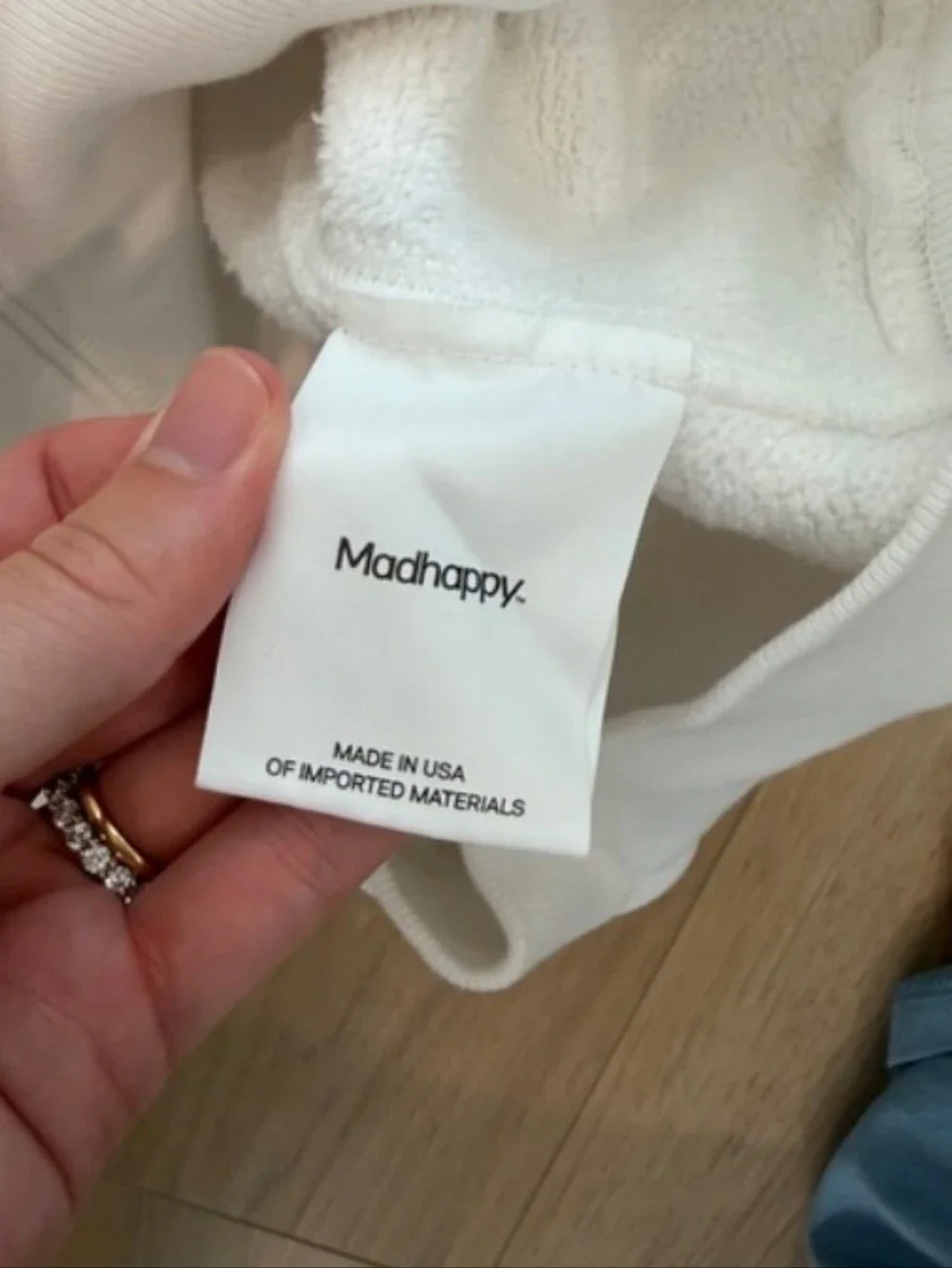 Madhappy White Crewneck Sweatshirt with Pink Logo Arch